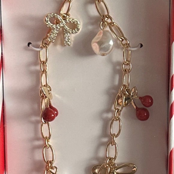 A New Day Gold Wristlet/Phone Strap with Red and White Charms - Picture 1 of 2